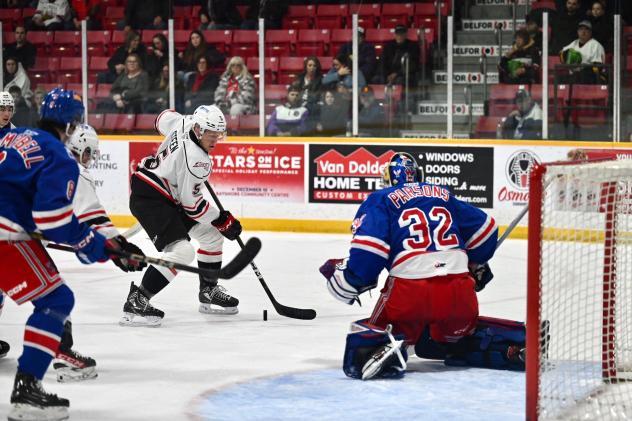 Kitchener Rangers' Jackson Parsons versus Owen Sound's Madden Steen
