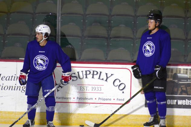 Wenatchee Wild forward Matt Savoie (left)