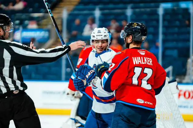 Bridgeport Islanders' Samuel Asselin and Springfield Thunderbirds' Nathan Walker on game night