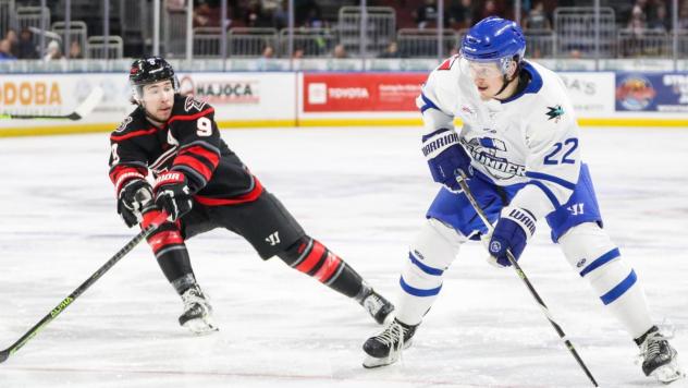 Wichita Thunder forward Michal Stinil (right) vs. the Rapid City Rush