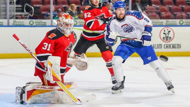 Wichita Thunder forward Andy Willis awaits the puck against the Rapid City Rush