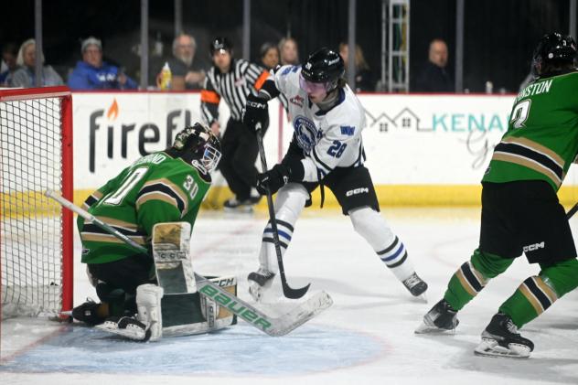 Wenatchee Wild's Conor Geekie battles Prince Albert Raiders' Max Hildebrand