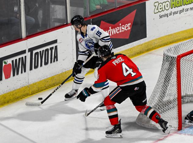 Wenatchee Wild's Briley Wood and Kelowna Rocket's Caden Price in action