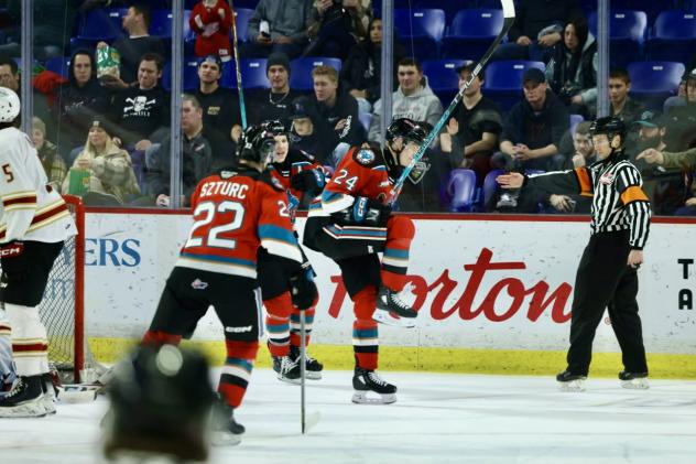 Kelowna Rockets and Dylan Wightman (24) react after his third period goal