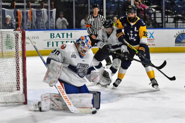 Worcester Railers' Tristan Lennox and Norfolk Admirals' Mathieu Roy in action