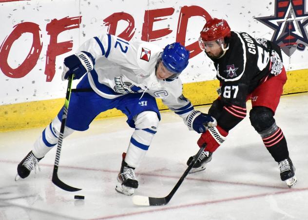 Wichita Thunder's Peter Bates battles Allen Americans' Hank Crone