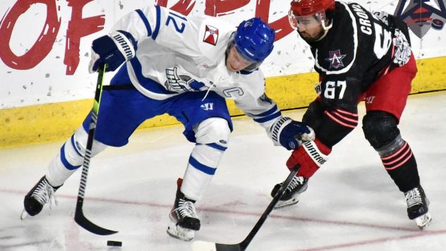 Wichita Thunder's Peter Bates battles Allen Americans' Hank Crone