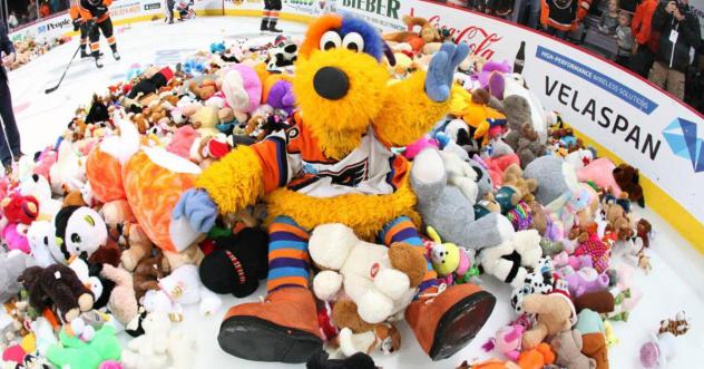Lehigh Valley Phantoms mascot meLVin in a pile of teddy bears