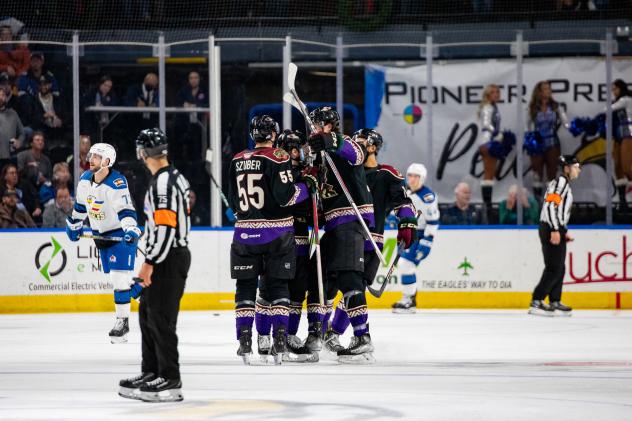 Tucson Roadrunners' Colin Theisen celebrates with teammates