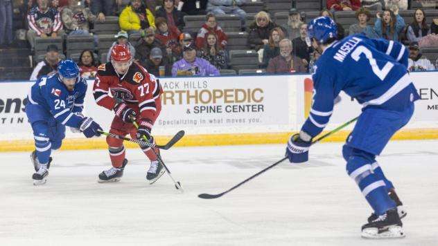 Wichita Thunder defensemen Nolan Kneen (left) and Jeremy Masella vs. the Rapid City Rush