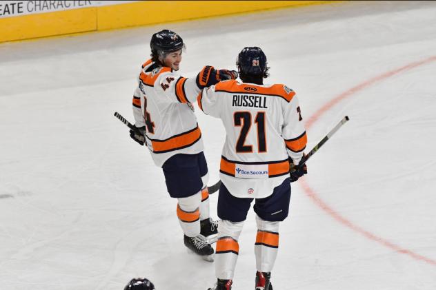 Greenville Swamp Rabbits exchange fist bumps