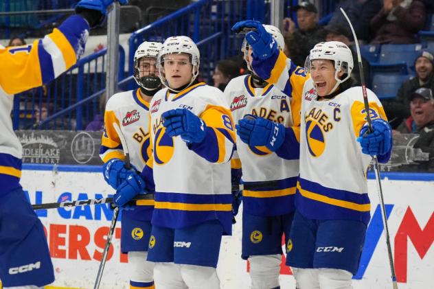 Saskatoon Blades react following a goal