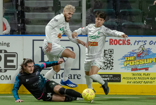 St. Louis Ambush forward William Eskay (lower) vs. the Dallas Sidekicks