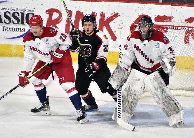 Allen Americans' Eric Williams and Chase Perry and Rapid City Rush's Keanu Yamamoto on game night