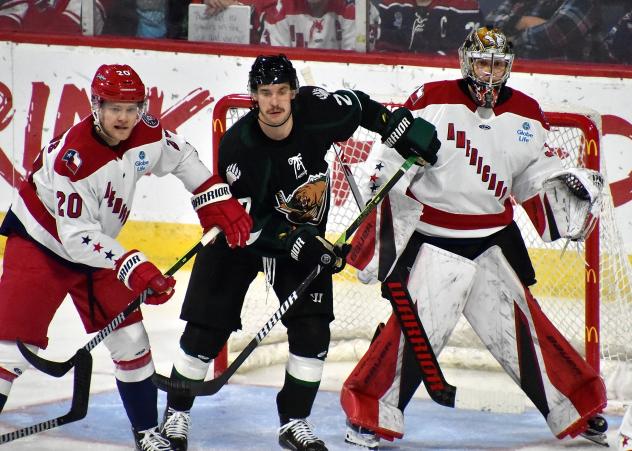 Allen Americans defenseman Eric Williams and goaltender Leevi Merilainen vs. the Utah Grizzlies