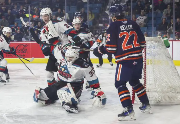 Kelowna Rockets' Nathan Kam and Kamloops Blazers' Jordan Keller on game night