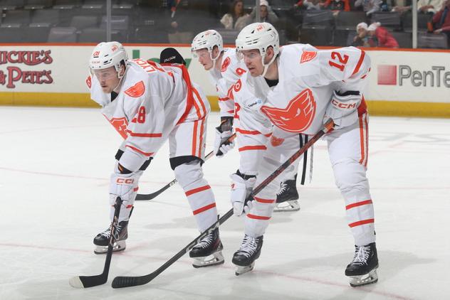Lehigh Valley Phantoms' Olle Lycksell, Tanner Laczynski, and Ronnie Attard on the ice