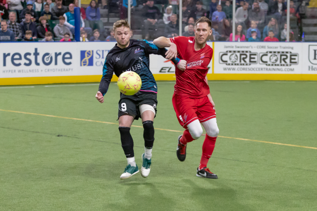 St. Louis Ambush forward Skylar Funk (left) vs. the Kansas City Comets