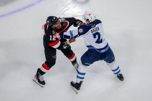 Belleville Senators left wing Bokondji Imama (left) tangles with defenceman Tyrel Bauer