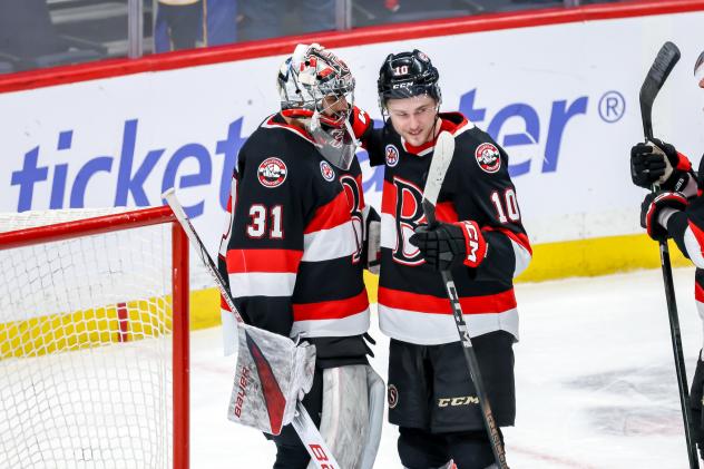 Belleville Senators goaltender Kevin Mandolese and centre Zack Ostapchuk