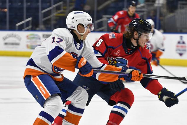 Bridgeport Islanders' Ruslan Iskhakov and Springfield Thunderbirds' Adam Gaudette in action