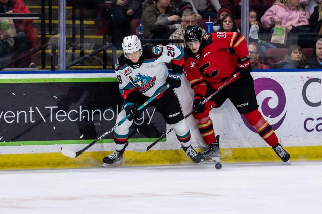 Kelowna Rockets' Hiroki Gojsic versus Prince George Cougars'Hunter Laing