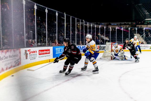 Red Deer Rebels' Dwayne Jean and Saskatoon Blades' Nicholas Andrusiak on game night