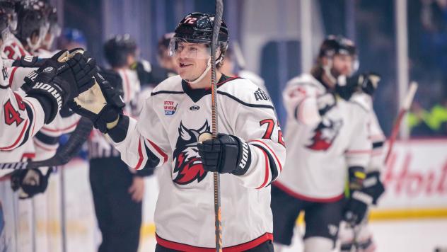 Adirondack Thunder defenseman Tristan Thompson receives a fist bump
