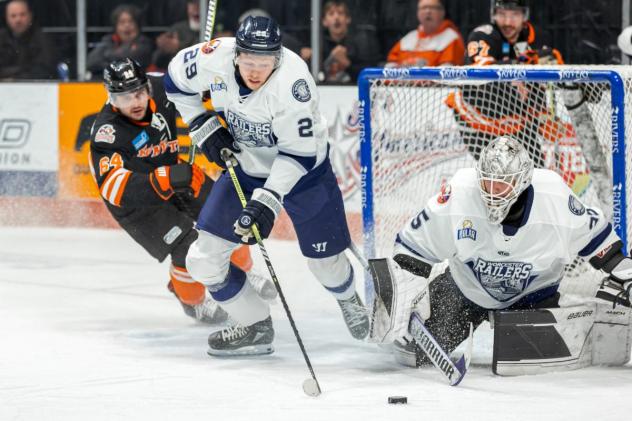 Worcester Railers' Riley Piercey and Fort Wayne Komets' Nolan Volcan in action