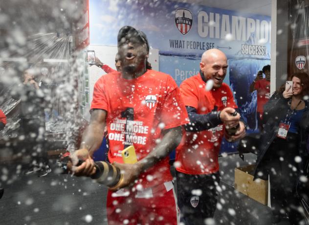 Atlético Ottawa forward Ballou Tabla (left) and Head Coach Carlos González celebrating 2022 CPL Regular Season title