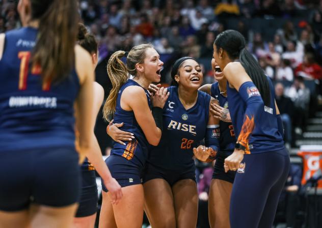 Grand Rapids Rise are all smiles during the opener