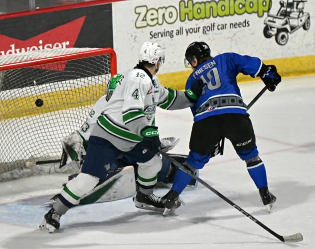 Wenatchee Wild's Evan Friesen and Seattle Thunderbirds' Scott Ratzlaff in action