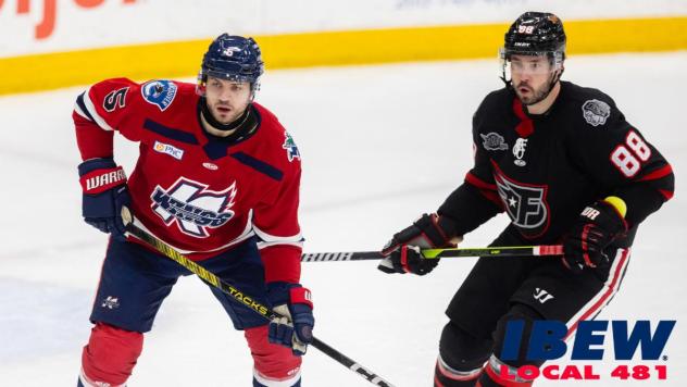 Indy Fuel forward Brett Bulmer (right) vs. the Kalamazoo Wings