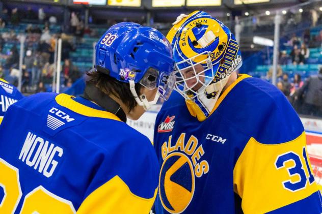 Saskatoon Blades' Trevor Wong and Austin Elliott on game night