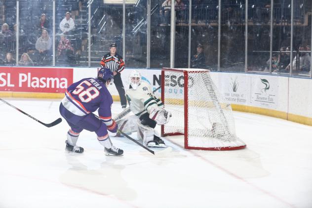 Youngstown Phantoms' Adam Pietila and Cedar Rapids RoughRiders' James Norton in action