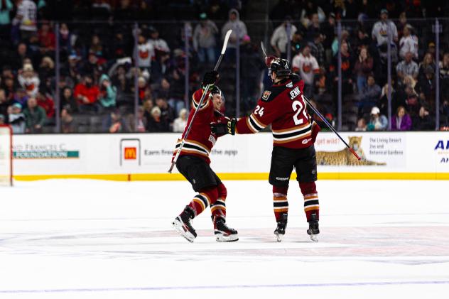 Tucson Roadrunners' John Leonard and Jan Jenik celebrate win