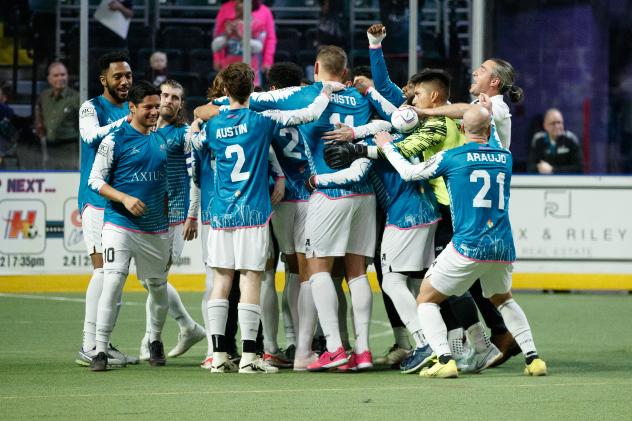 St. Louis Ambush celebrate a goal against the Kansas City Comets