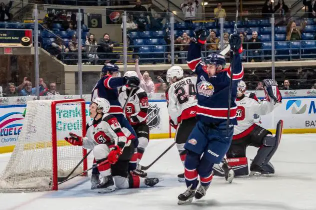 Matyas Sapovaliv celebrates the overtime goal against the Ottawa 67's