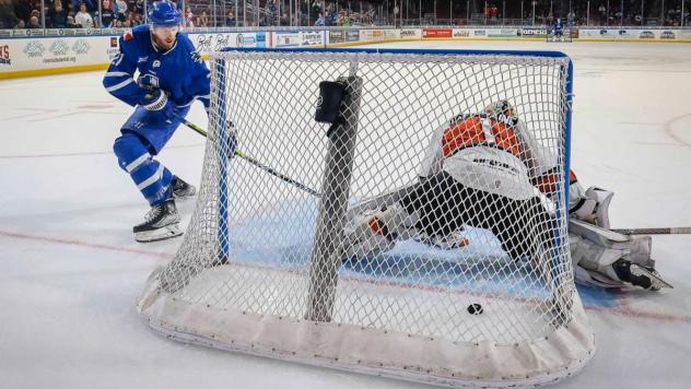 Jay Dickman of the Wichita Thunder scores the shootout winner against the Kansas City Mavericks