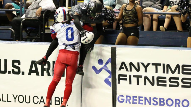 San Diego Strike Force quarterback Nate Davis is driven out of bounds
