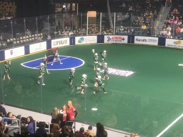A kids lacrosse game during a break in action at the Georgia Swarm game