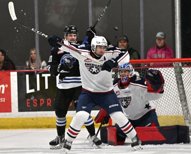 Wenatchee Wild's Evan Friesen and Lukas Matecha and Tri-City Americans' Ethan Peters on game night