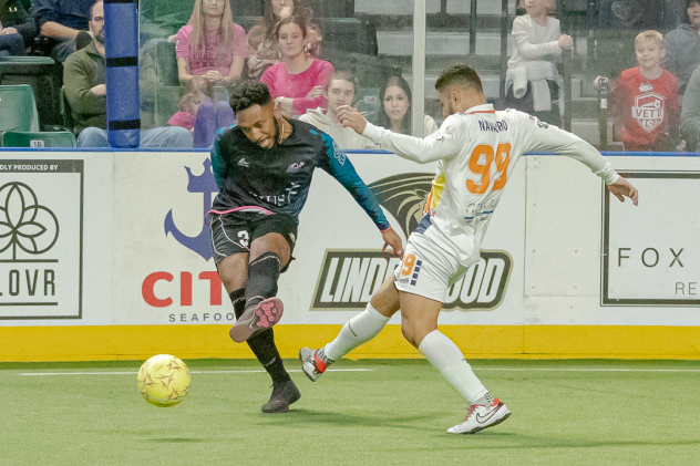 St. Louis Ambush's Christian Briggs and Tacoma Stars' Sebastian Navarro in action
