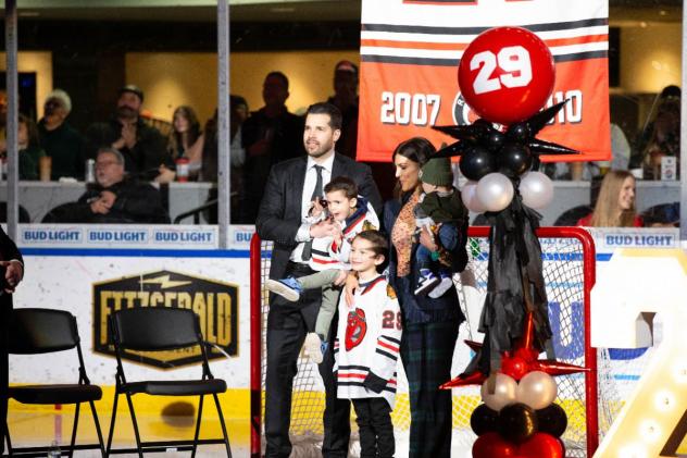 Rockford Ice Hogs' Corey Crawford and his family during his number retiring ceremony