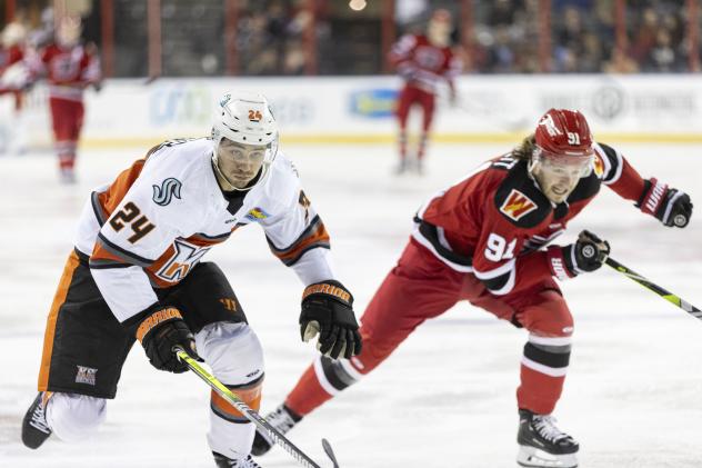 Kansas City Mavericks' Marc-Olivier Duquette and Rapid City Rush's Blake Bennett on game night