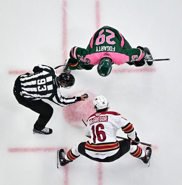 Tucson Roadrunners in the faceoff circle