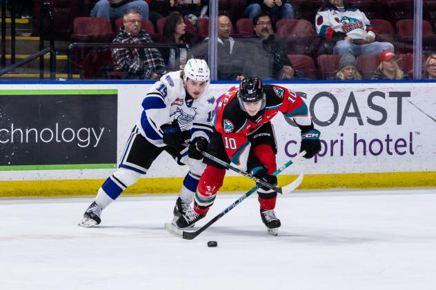 Kelowna Rockets right wing Luke Schelter (right) vs. the Victoria Royals