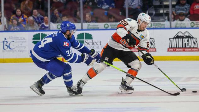 Wichita Thunder vie for the puck vs. the Kansas City Mavericks