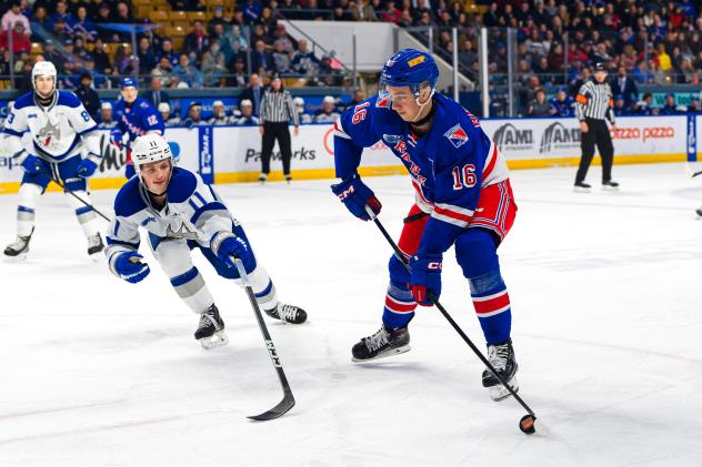 Kitchener Rangers centre Carson Rehkopf with the puck against the Sudbury Wolves