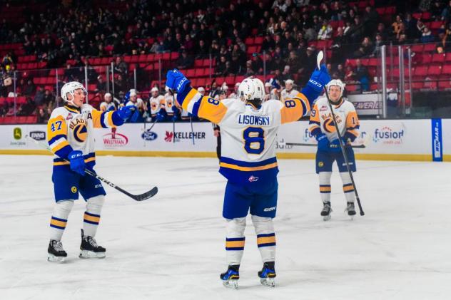 Forward Brandon Lisowsky and the Saskatoon Blades celebrate